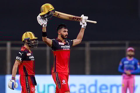 Devdutt Padikkal of Royal Challengers Bangalore celebrates after scoring a hundred. (Photo | PTI)