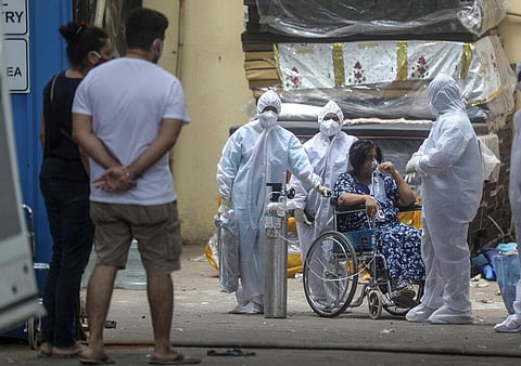Health workers attend to a patient at the Jumbo COVID-19 hospital in Mumbai, India, Thursday, April 22, 2021. (Photo | AP)
