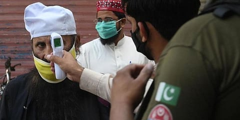 At least 53,818 coronavirus tests were conducted across the country in the last 24 hours. (Photo | AFP)