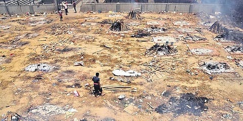 Funeral pyres of COVID-19 victims at a crematorium in Delhi on Friday. (Photo | Parveen Negi, EPS)