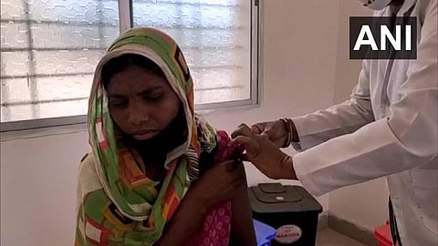 A woman is being vaccinated in Bijapur, Chhattisgarh (Photo | Twitter/ANI)