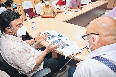 Health Minister Dr K Sudhakar holds a meeting with health department officials and eminent citizens in Bengaluru on Sunday | Express
