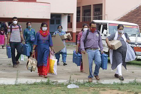 Officers heading out from the mustering centre at St Joseph's Convent in Madikeri (Photo | Special arrangement)