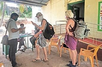 Foreign nationals stuck in Gokarna seek information on vaccination