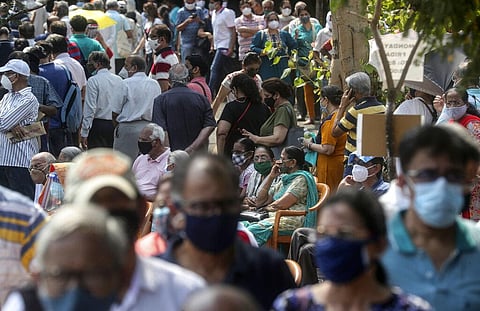In this April 26, 2021, file photo, people queue up for COVID-19 vaccine in Mumbai, India. (Photo | AP)