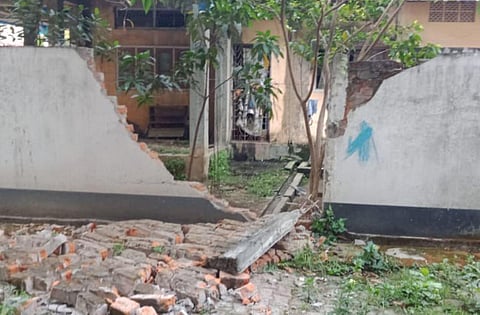 A damaged wall in Guwahati. (Photo | Twitter/@himantabiswa)