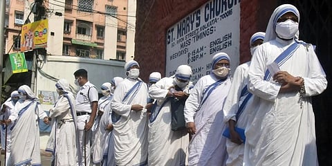 Missionaries of Charity Sisters wait to cast their vote during the last phase of West Bengal Assembly election, in Kolkata on Thursday. (Photo | ANI)