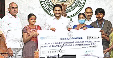 Chief Minister YS Jagan Mohan Reddy handing over Jagananna Vasathi  Deevena benefits to selected students at his camp office in Tadepalli on Wednesday | Express