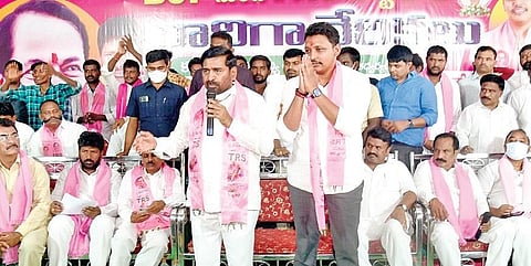 Energy Minister G Jagadish Reddy addresses an election meeting at Halia on Friday. TRS bypoll candidate Nomula Bagath is also seen