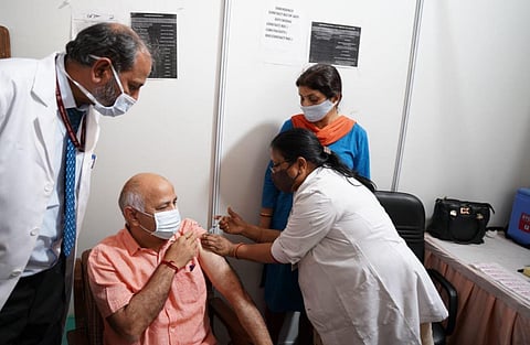 Delhi Deputy Chief Minister Manish Sisodia takes the Covid-19 vaccine. (Photo | Manish Sisodia Official Twitter)