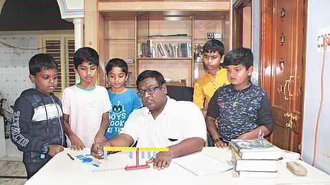 Mahesha M with his students. (Photo| EPS)