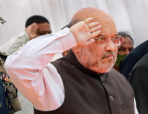 Union Home Minister Amit Shah pays tribute to the 22 CRPF Personnel who lost their lives in Bijapur Naxal attack, in Jagdalpur, Monday. (Photo | PTI)