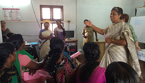 Beena Sebastian, chairperson of The Cultural Academy for Peace interacting with inmates.