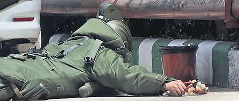 Bomb squad inspect the suspicious object near National Media Centre. (Photo | Parveen Negi, EPS)