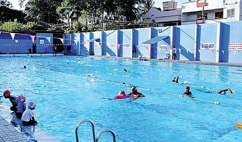 A file picture of kids swimming before pools were ordered shut