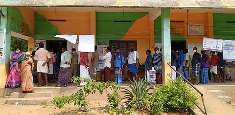People waiting to cast their vote at Student. Aylosius L P school Mampally near Anchuthengu in Thiruvananthapuram on Tuesday. (BP Deepu | Express Photo)