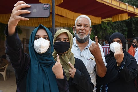 People taking a selfie after casting their vote in Chennai. (Photo | R Satish Babu, EPS)