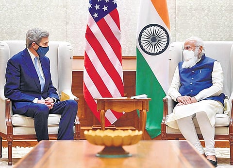 PM Narendra Modi with US Special Presidential Envoy for Climate John Kerry. (Photo | PTI)