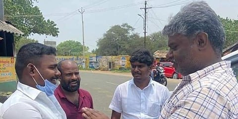 Tenkasi MP Dhanush M Kumar with Saravanan. (Photo by special arrangement)