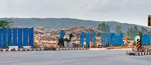 Activists raise red flag over transferring of waste to dumpyard near reserve forest