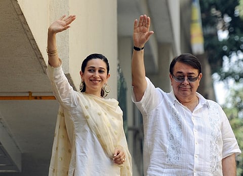 Randhir Kapoor (R) with daughter Karishma Kapoor. |AFP