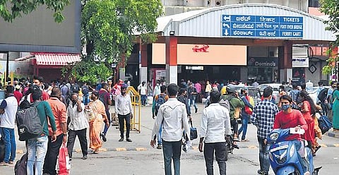 KSR Railway Station was crowded with people who wanted to board trains to their hometowns before the lockdown came into effect, in Bengaluru on Sunday  | sriram b n
