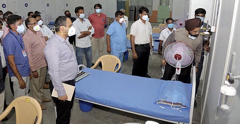 Gagandeep Singh Bedi inspecting the new  Covid Care Center at Trade Centre. (Photo | Express)