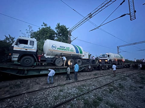 Empty wagons loaded with two cryogenic tanks leave Tiruvallur for Rourkela to ferry liquid medical oxygen. (Photo | By special arrangement)