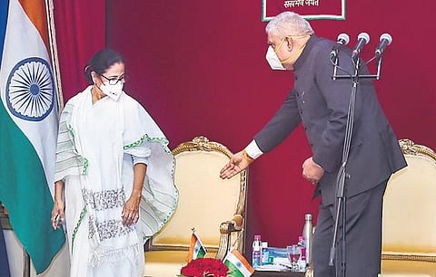 West Bengal Chief Minister Mamata Banerjee and Governor Jagdeep Dhankar during swearing-in ceremony of new minister of the State | PTI