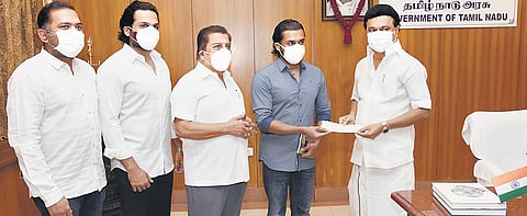 Actors Sivakumar, Suriya and Karthi met Chief Minister MK Stalin at the Secretariat and gave him a cheque for `1 crore towards Covid relief measures