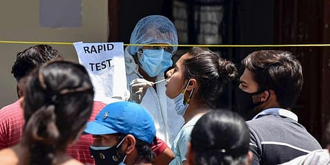 A total of 3,43,144 new coronavirus infections were registered in a day. (Photo | PTI)