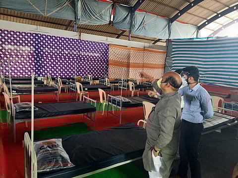 Home minister Basavaraj Bommai inspects Covid Care Centre at his house in Shiggaon. (Photo | Express)