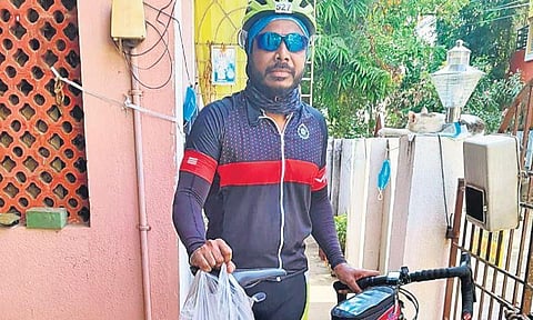 A volunteer part of the Relief Riders group | Express