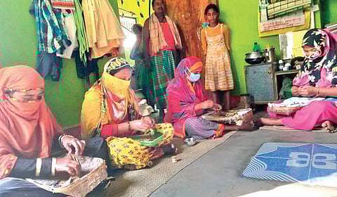A group of women binding beedi in Kendrapara | Express