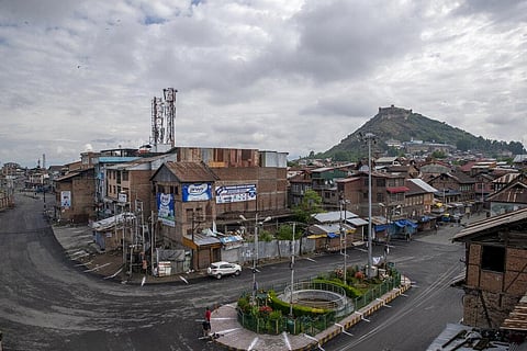 A view of a deserted road during lockdown to curb the spread of coronavirus, as Kashmiris mark Eid al Fitr, in Srinagar. (Photo | AP)