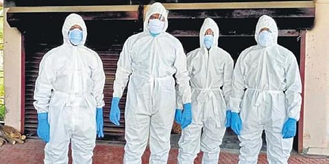 Volunteers of Sahrudaya Samaritans in PPE kits. (Photo| EPS)