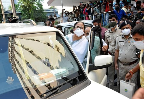 West Bengal CM Mamata Banerjee leaves the CBI office at Nizam Palace where she had come following the arrest of TMC ministers and MLAs in a scam case. (Photo | PTI)