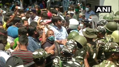 A large number of TMC supporters staged a protest outside the CBI office after party leaders were arrested by the agency. (Photo | ANI)