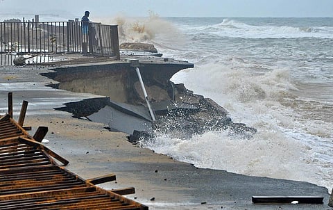 Authorities have closed down the road in front of the Shankhumukham beach that was taken away by the rough sea in the heavy rain that has been lashing Thiruvananthapuram. (Photo | B P Deepu, EPS)