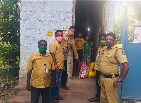 Drivers of Janamaitri autorickshaw stand drop off supplies at a house. (Photo| EPS)