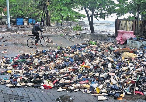 Waste piled up in fort-kochi beach following the waves during the heavy rain | A Sanesh