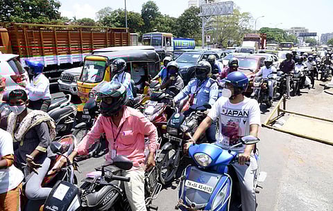Chennai cops check motorists as e-registration was made mandatory for persons travelling from one police station limits to another, in Chennai(Photo | R Satish Babu, EPS)