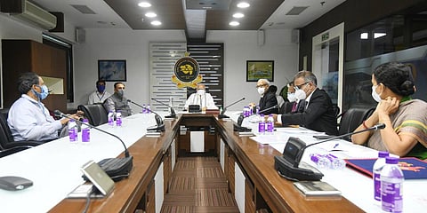 PM Modi chairs a meeting with Gujarat CM Vijay Rupani and other officials to review the situation post cyclone Tauktae. (Photo| Twitter/ @PIBAhmedabad)