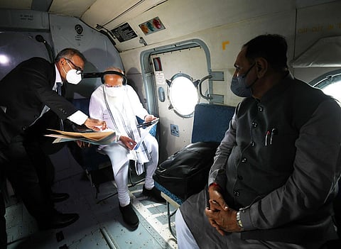 PM Narendra Modi conducting an aerial survey of the areas of Amreli, Gir Somnath and Bhavnagar districts hit by Cyclone Tauktae in Gujarat. (Photo | PIB)
