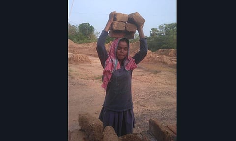 Sangeeta Soren working at a brick kiln (Photo | Special arrangement)