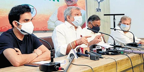 Gautam Gambhir, Adesh Gupta & other BJP leaders at a press meet. (Photo | Express)