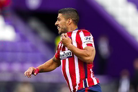 Atletico Madrid's Luis Suarez celebrates after scoring goal during match against Valladolid at Jose Zorrilla stadium in Valladolid, Spain, Saturday, May 22, 2021. (Photo | AP)