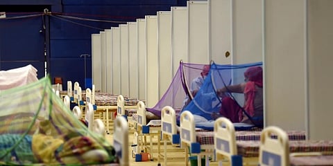 Patients receive treatment at the COVID care centre at CWG Village in New Delhi. (Photo | PTI