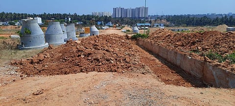 Work on creating amenities at the Nadaprabhu Kempegowda Layout has slowed down considerably (Photo | Special arrangement)