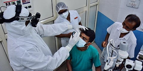 Doctors conduct eye check-up of patients suspected to have been infected with mucormycosis, in Thane. (Photo | PTI)